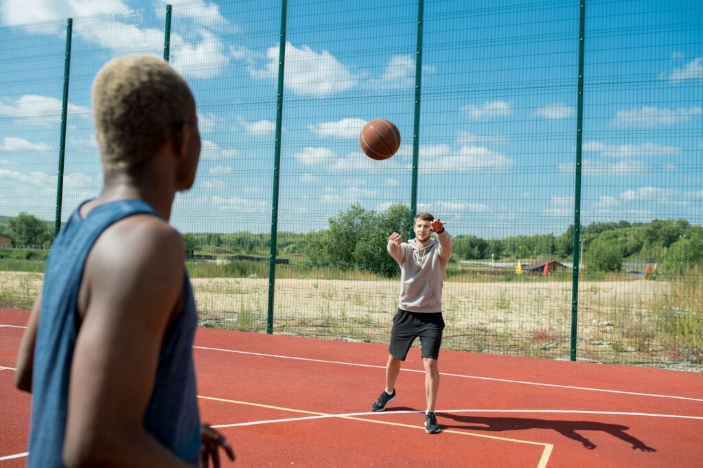 Guys Playing Basketball